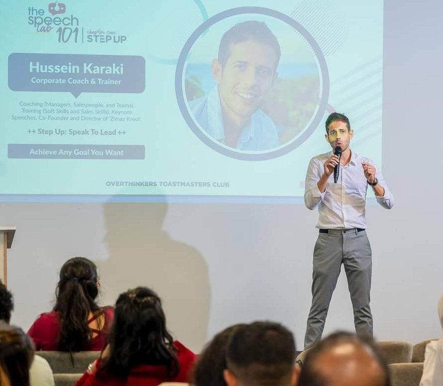 Hussein Karaki speaking to a corporate audience